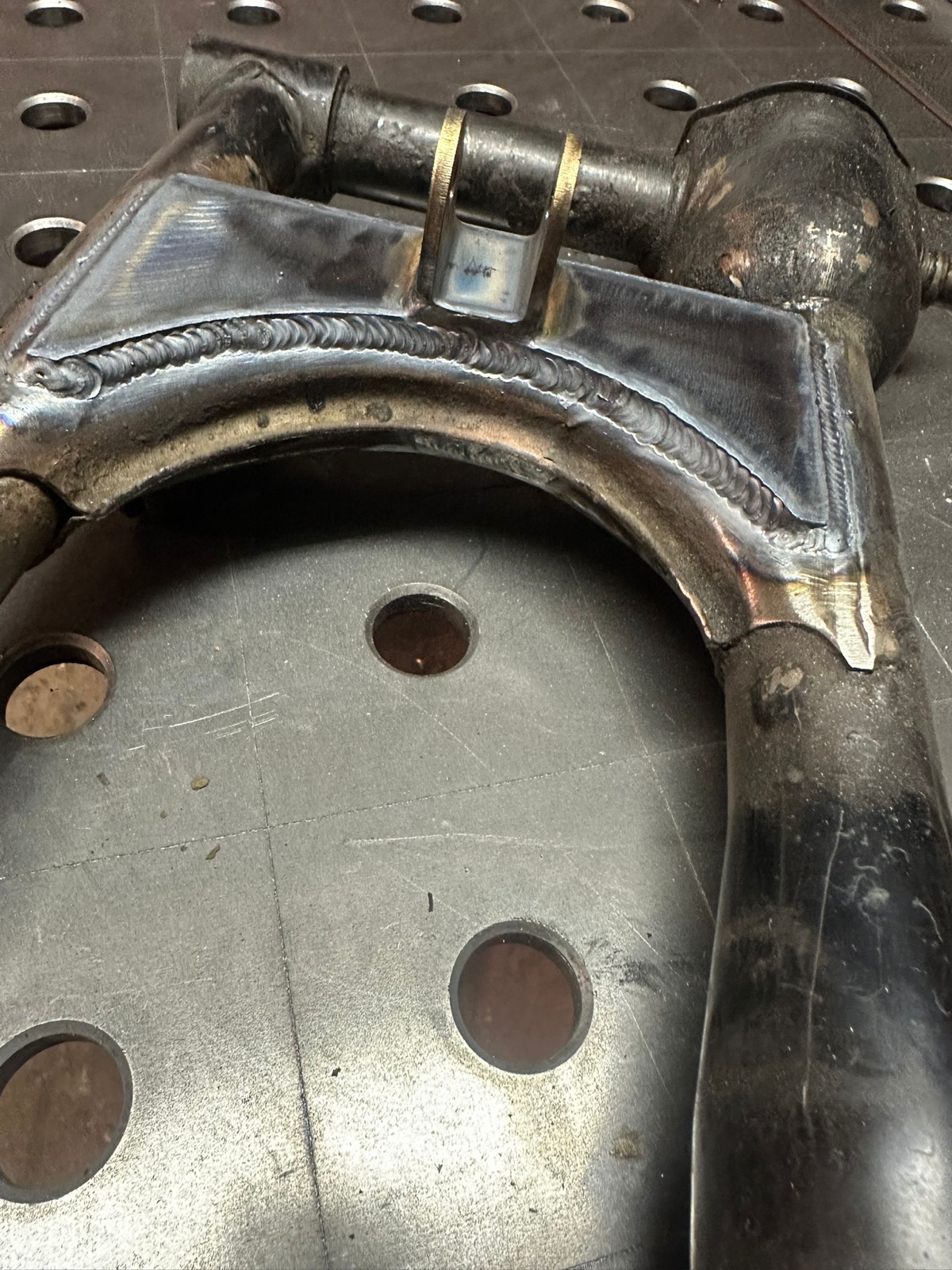 Close-up of welded gusset reinforcement on the CX500 frame