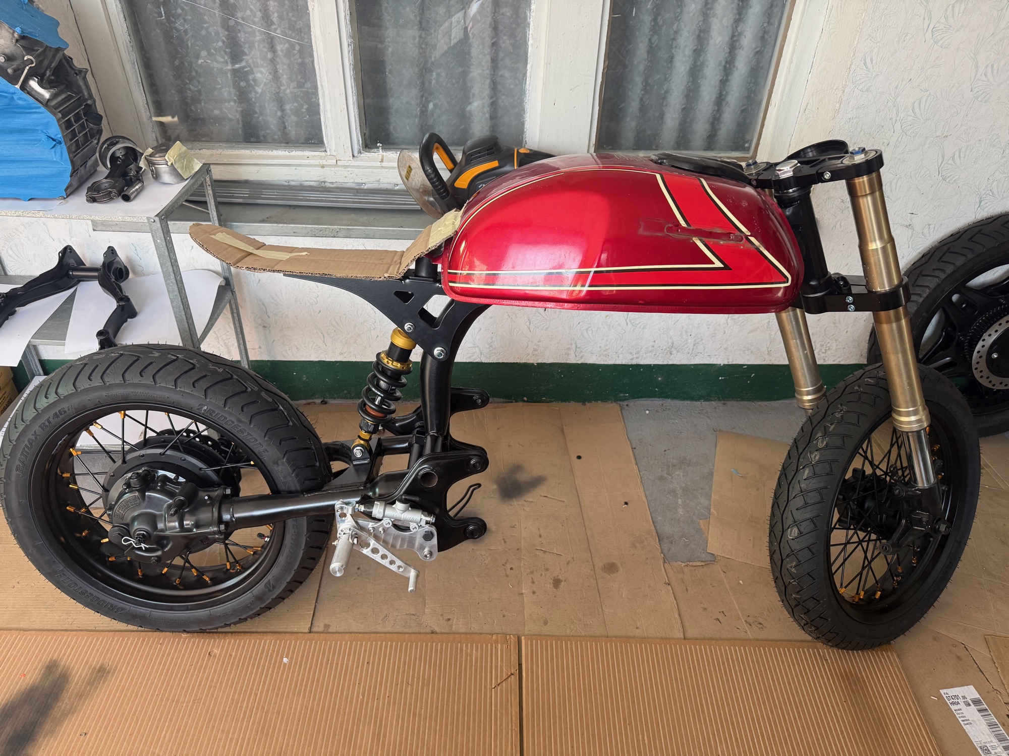Honda CX500 cafe racer engine and frame in the Canarin Garage workshop